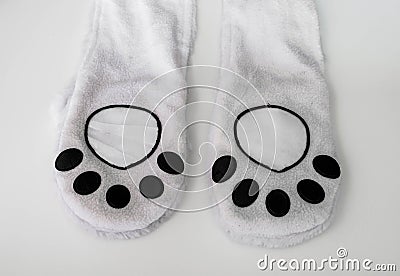 Abstract animal paw, part of clothes Stock Photo