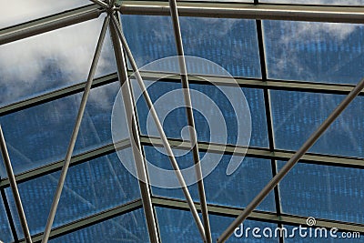 Abstract architecture background, greenhouse roof with blue sky and clouds Stock Photo