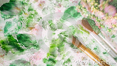 Abstract art hand watercolor and brushes, floral background. Blurred romantic concept of spring, lifestyle, hobbies. Top Stock Photo