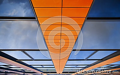 Abstract background in blue and orange colors of the wall of an Stock Photo