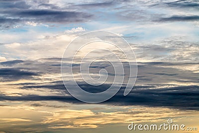 Abstract background, blue sky with dark cumulonimbus clouds. Stock Photo