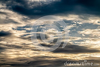 Abstract background, blue sky with dark cumulonimbus clouds. Stock Photo