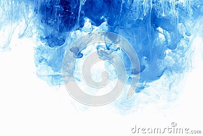 Abstract background color ink drop in water. Blue cloud of paint on white. Stock Photo