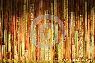 Abstract background of color strips in the form of a concert curtain. Stock Photo