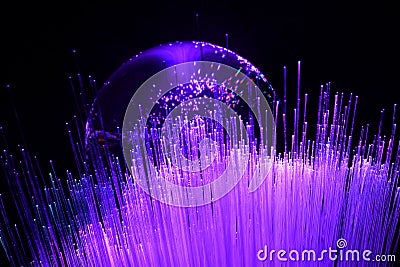 Abstract background with colored fibers optics reflected on glass sphere Stock Photo