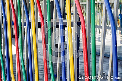 Abstract background of colored pipes. It`s colorful fence. Stock Photo