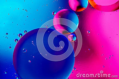 Abstract background with colorful pink blue gradient colors. Oil drops in water abstract psychedelic pattern image Stock Photo
