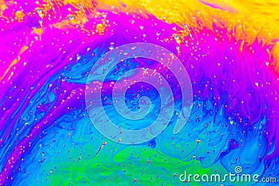 Abstract background with colorful rainbow gradient colors. Soap bubble close up psychedelic macro abstraction. Art design Stock Photo