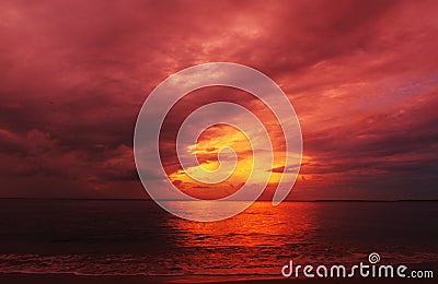 Abstract background colors fire in the sky summer sunset over sea Stock Photo