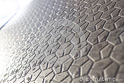 Abstract background of geometric shapes, shapes on the pavement, a futuristic background of hexagons Stock Photo
