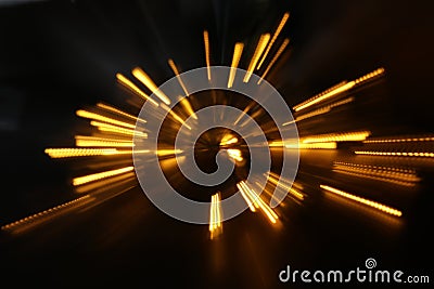 abstract background of golden light burst made from bokeh motion Stock Photo