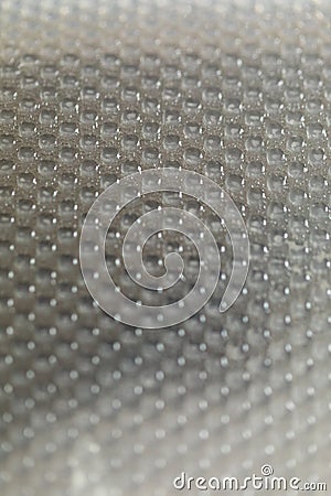 Abstract background of lots of grey pimples dots. Plastic surface with pimples Stock Photo