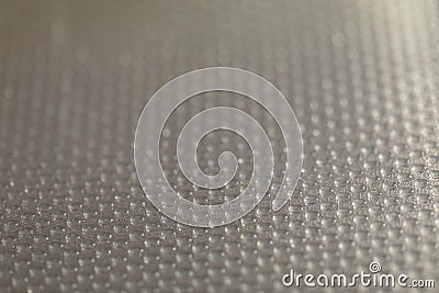 Abstract background of lots of grey pimples dots. Plastic surface with pimples Stock Photo