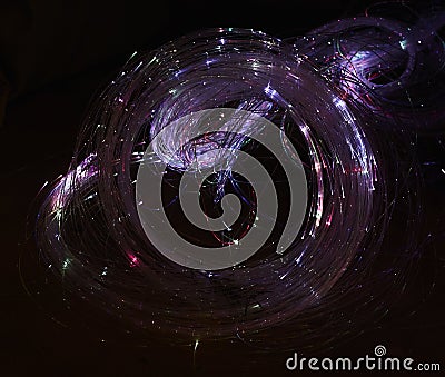 Abstract background. Luminous swirling. Elegant glowing. Sparking particle. Glint lines. Stock Photo