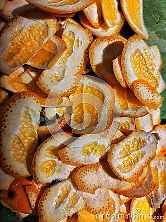 Abstract background of mandarin peel pieces Stock Photo