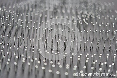 Abstract background of many iron pins. Selective focus. Stock Photo