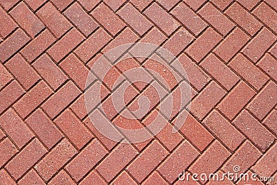 Abstract background from paving red tiles, bricks. Top view of the pavement pattern. Concept for construction, urban environment Stock Photo