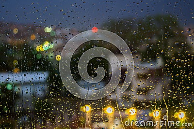 Abstract background raindrops on blurred lights background Stock Photo