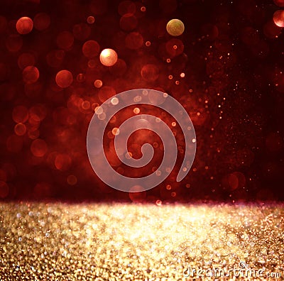 Abstract background of red and gold glitter bokeh lights, defocused Stock Photo