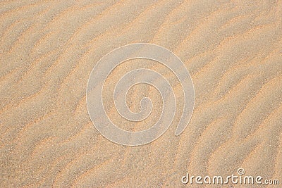 sandy sea on the beach. Wave sand texture Stock Photo