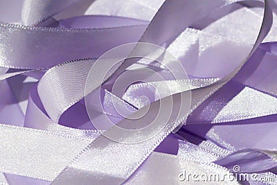 Abstract background of satin purple ribbons. Stock Photo