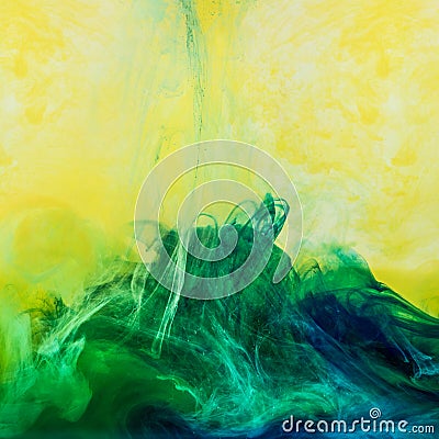 abstract background with swirls of green paint in yellow water Stock Photo
