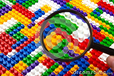 Abstract background texture of colored constructor blocks. Background of colorful plastic part of constructor. Pile of colored toy Stock Photo