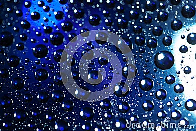 Abstract background texture drops of water and art light on glass. Creative space design Stock Photo