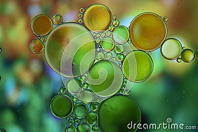 Abstract background with vibrant colours. Oil drops in water. Close colorful and artistic bubbles. Space pattern Stock Photo