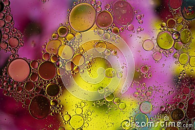 Abstract background with vibrant colours. Oil drops in water. Close colorful and artistic bubbles. Space pattern Stock Photo