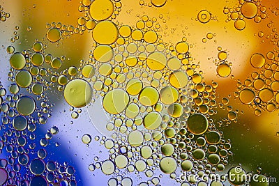 Abstract background with vibrant colours. Oil drops in water. Close colorful and artistic bubbles. Space pattern Stock Photo