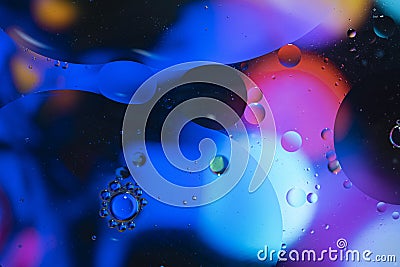 Abstract background with vibrant colours. Oil drops in water. Close colorful and artistic bubbles. Space pattern Stock Photo