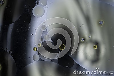 Abstract background with vibrant colours. Oil drops in water. Close colorful and artistic bubbles. Space pattern Stock Photo