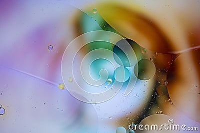 Abstract background with vibrant colours. Oil drops in water. Close colorful and artistic bubbles. Space pattern Stock Photo