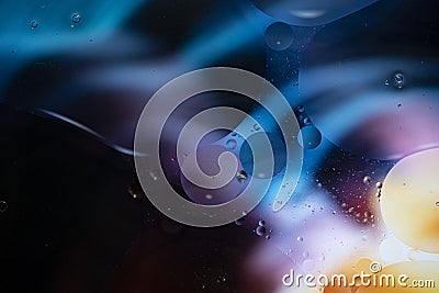 Abstract background with vibrant colours. Oil drops in water. Close colorful and artistic bubbles. Space pattern Stock Photo