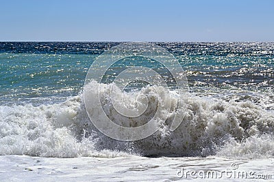 Abstract background. Waves of water of the sea during high tide and low tide. Whirlpools of the maelstrom. Sea wave with foam and Stock Photo