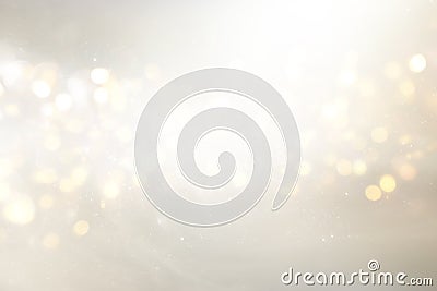 Abstract backgrounf of glitter vintage lights . silver, gold and white. de-focused Stock Photo