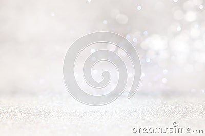 Abstract backgrounf of glitter vintage lights . silver and white. de-focused Stock Photo