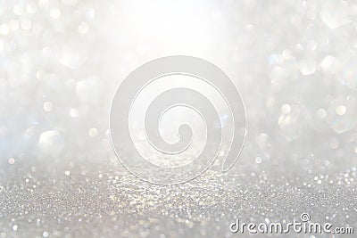 Abstract backgrounf of glitter vintage lights . silver and white. de-focused Stock Photo