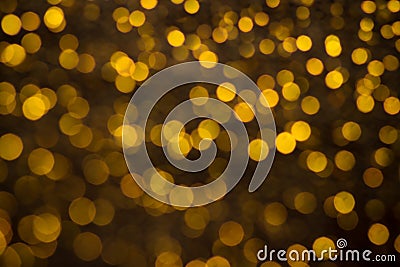 Abstract backgroung of golden glitter and glow soft bokeh shining light. Dreamy sparkle background Stock Photo