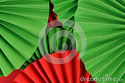 Abstract backrgound with paper craft rosettes in traditional Christmas colors red and green Stock Photo