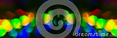 Abstract banner. Background consisting of multi-colored circles. Defocus, black background Stock Photo