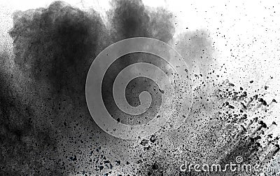 Abstract black dust explosion on white background. Stock Photo