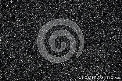 Abstract black shiny background, pattern. Dark sparkle texture, backdrop. Material, paper design. Glowing tinsel. Stock Photo