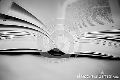 Abstract black and white colored book on a black background Stock Photo
