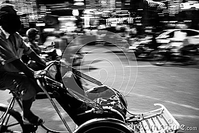 abstract movement of cyclo driver in vietnam Stock Photo