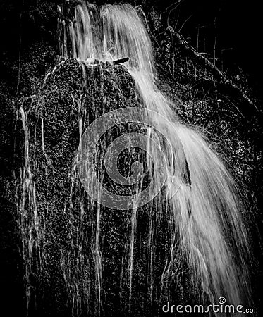 Abstract Black and white smooth waterfall background. Stock Photo