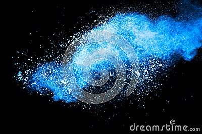 Abstract blue dust explosion on black background. Stock Photo