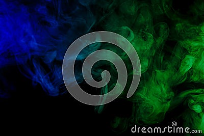 Abstract blue and green smoke hookah on a black background. Stock Photo