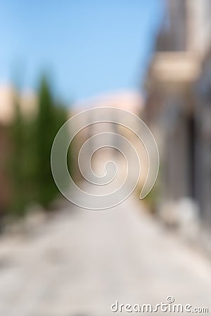 Abstract blur background of urban city in summer day, vertical. Deserted street Stock Photo